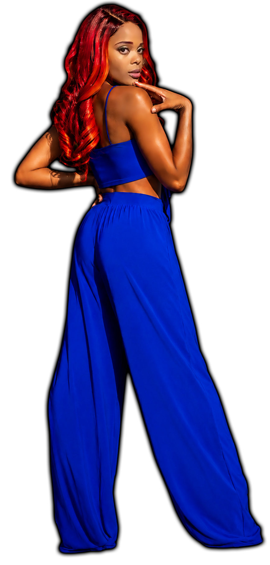 AlxZandria standing in a flowing cobalt blue two-piece